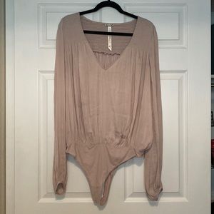 Large Long sleeve bodysuit by Free People.